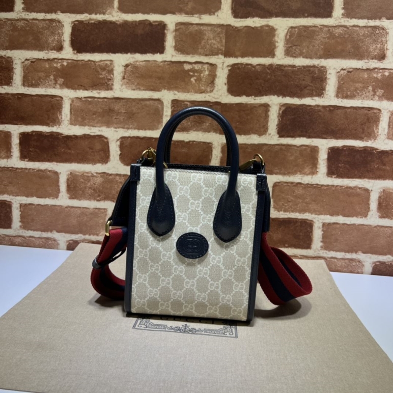 G*u*i shopping bags